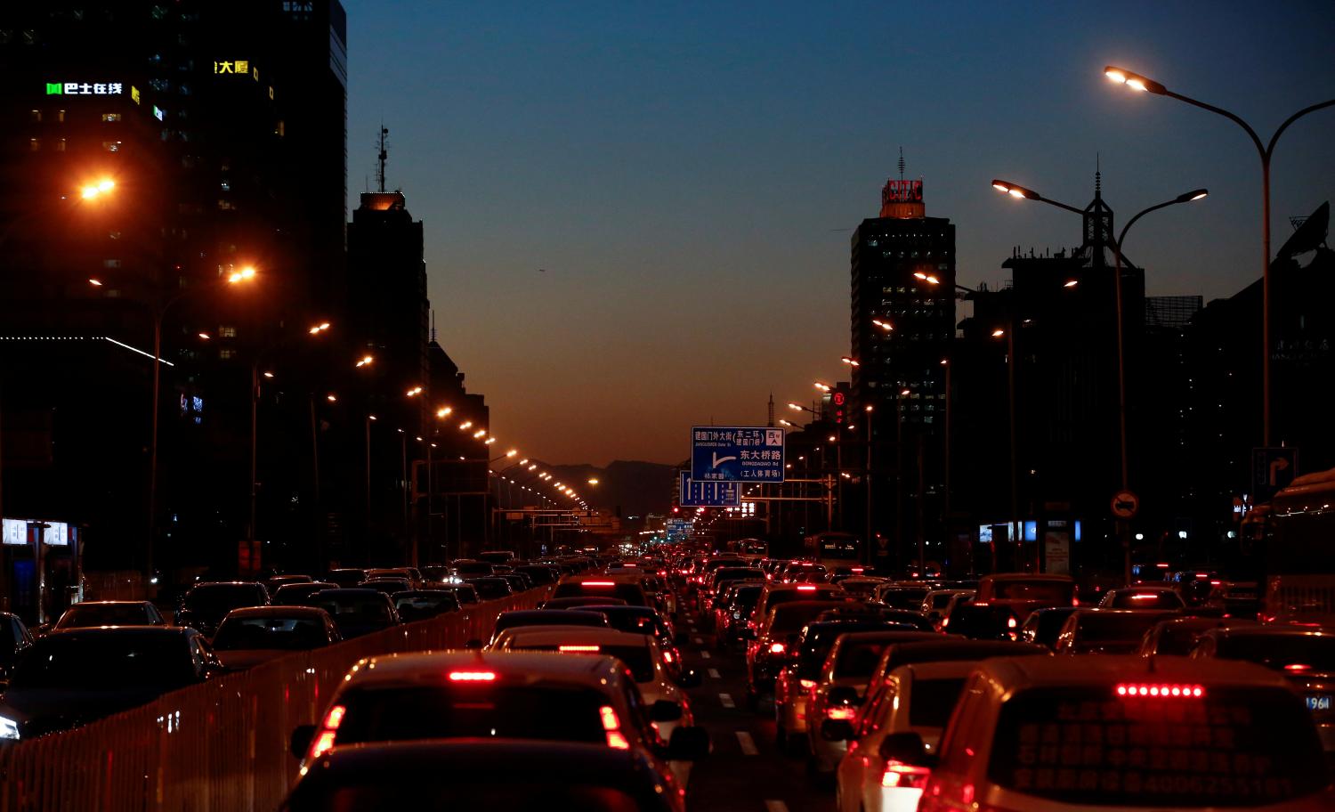Cars stand bumper to bumper in the evening rush hour traffic jam in central Beijing, China