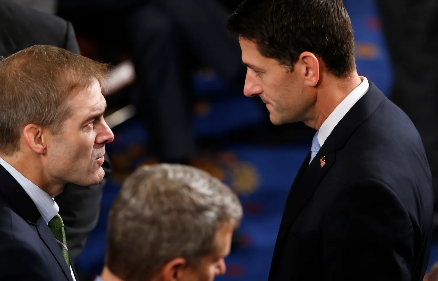 Rep. Paul Ryan (R-WI) (R) talks with House Freedom Caucus chairman Rep. Jim Jordan (L) on the floor prior to the start of the election for the new Speaker of the U.S. House of Representatives in the House Chamber in Washington