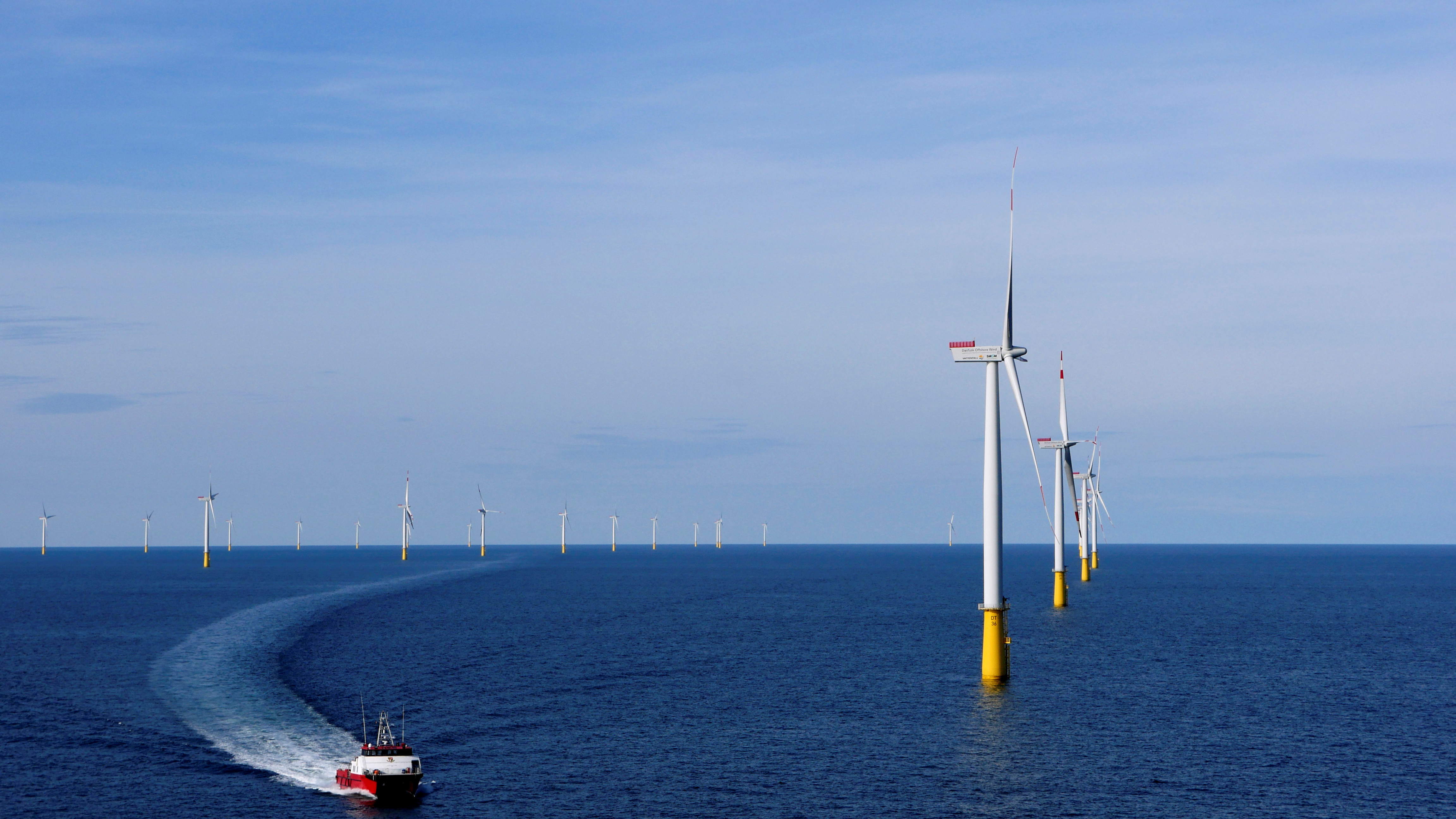 A boat sails past DanTysk wind farm, 90 kilometres west of Esbjerg