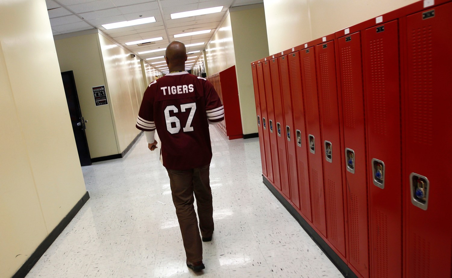 Walter H. Dyett High School principal Charles Campbell tours the school in Chicago, Illinois