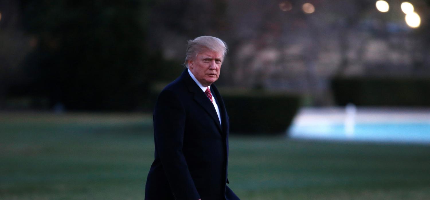 U.S. President Donald Trump walks from Marine One as he returns to the White House in Washington, U.S., March 5, 2017. REUTERS/Joshua Roberts - RTS11KEL