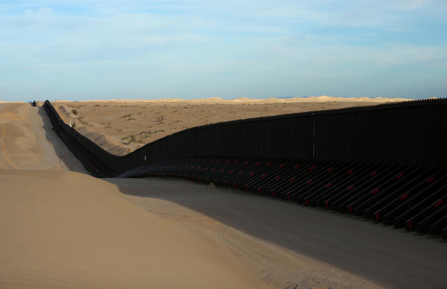 The border fence between Mexico and the United States is pictured near Calexico, California, U.S. February 8, 2017. Picture taken February 8, 2017. REUTERS/Mike Blake - RTX30D00