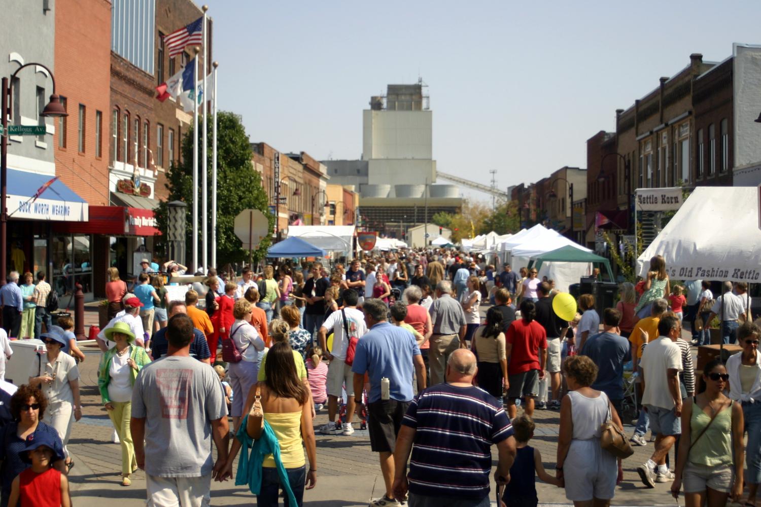 A street festival in Ames Iowa at their Main Street Cultural District
