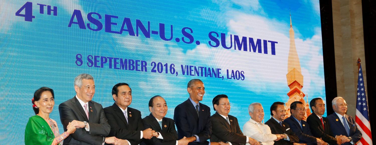 Myanmar's State Counsellor Aung San Suu Kyi (L-R), Singapore's Prime Minister Lee Hsien Loong, Thailand's Prime Minister Prayut Chano-cha, Vietnam's Prime Minister Nguyen Xuan Phuc, U.S. President Barack Obama, Laos Prime Minister Thongloun Sisoulith, Philippines Foreign Affairs Secretary Perfecto Yasay, Brunei's Sultan Hassanal Bolkiah, Cambodia's Prime Minister Hun Sen, Indonesia's President Joko Widodo and Malaysia's Prime Minister Najib Razak stand together for a family photo before their U.S.-ASEAN meeting as a part of the ASEAN Summit in Vientiane, Laos September 8, 2016. REUTERS/Jonathan Ernst TPX IMAGES OF THE DAY - RTX2ON65