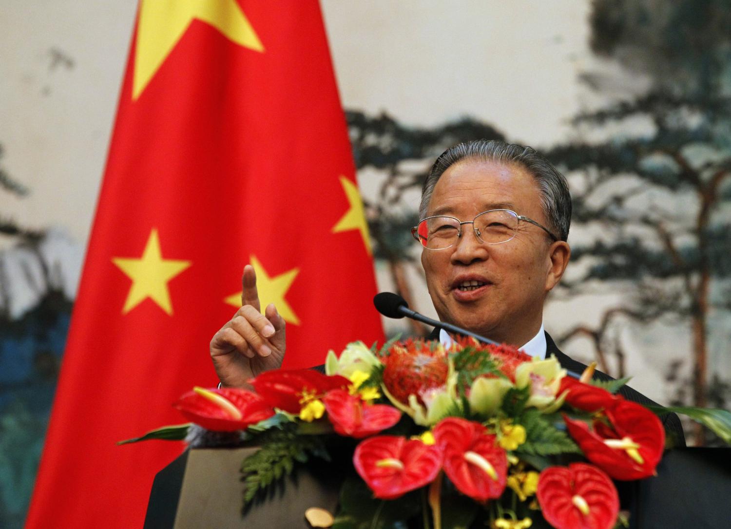 Chinese State Councillor Dai Bingguo speaks during a news briefing with European Union (EU) Foreign Policy Chief Catherine Ashton (not pictured) at the Diaoyutai State Guest House in Beijing, July 10, 2012. REUTERS/Ng Han Guan/Pool (CHINA - Tags: POLITICS) - RTR34SA6