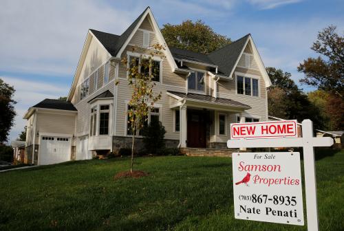 A real estate sign advertising a new home for sale is pictured in Vienna, Virginia, U.S.