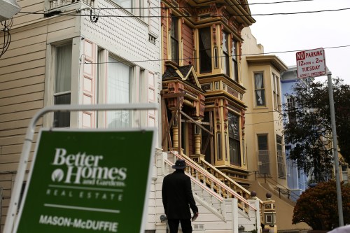 A real state sign is seen near a row of homes in the Haight Ashbury neighborhood in San Francisco, California.