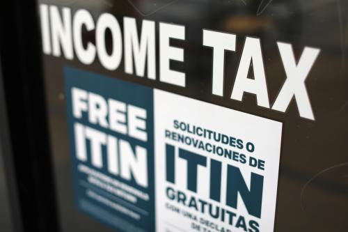 A tax sign is pictured on an H&R Block tax office.