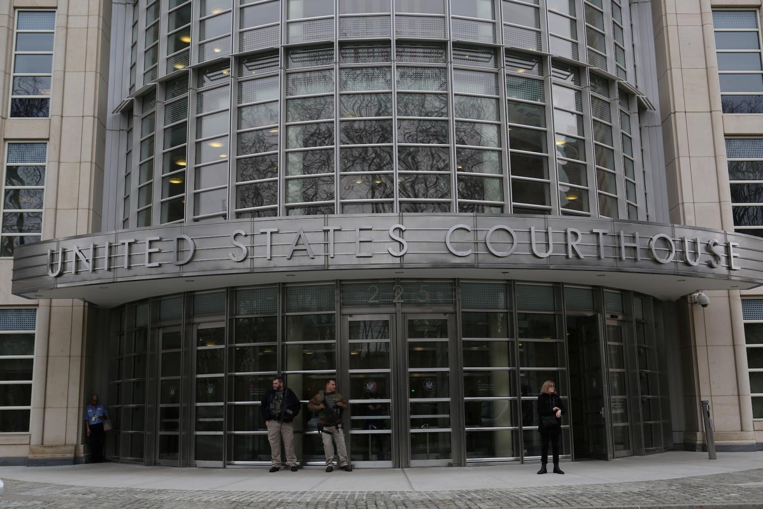 People stand outside the federal courthouse during the arraignment of Joaquin "El Chapo" Guzman in the Brooklyn borough of New York City, New York, U.S. January 20, 2017. REUTERS/Joe Penney - RTSWIAR