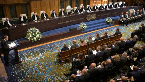 United Nations Secretary-General Ban Ki-moon, left, speeches during a ceremony marking the 70th anniversary of the International Court of Justice in The Hague, Netherlands, Wednesday, April 20, 2016. REUTERS/Peter Dejong/Pool - RTX2AS8R