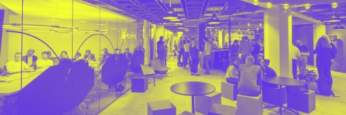 MTWTF designed cover photo of the Innovation spaces report: a modern, open office space is presented in a purple/yellow tint