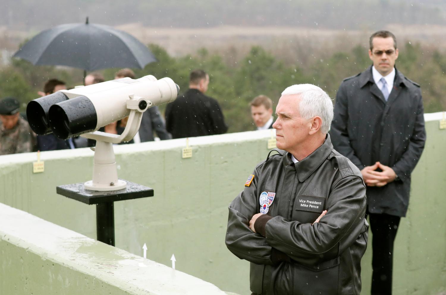 Vice President Mike Pence looks toward the north from an observation post inside the demilitarized zone separating the two Koreas, in Paju, South Korea. REUTERS/Kim Hong-Ji
