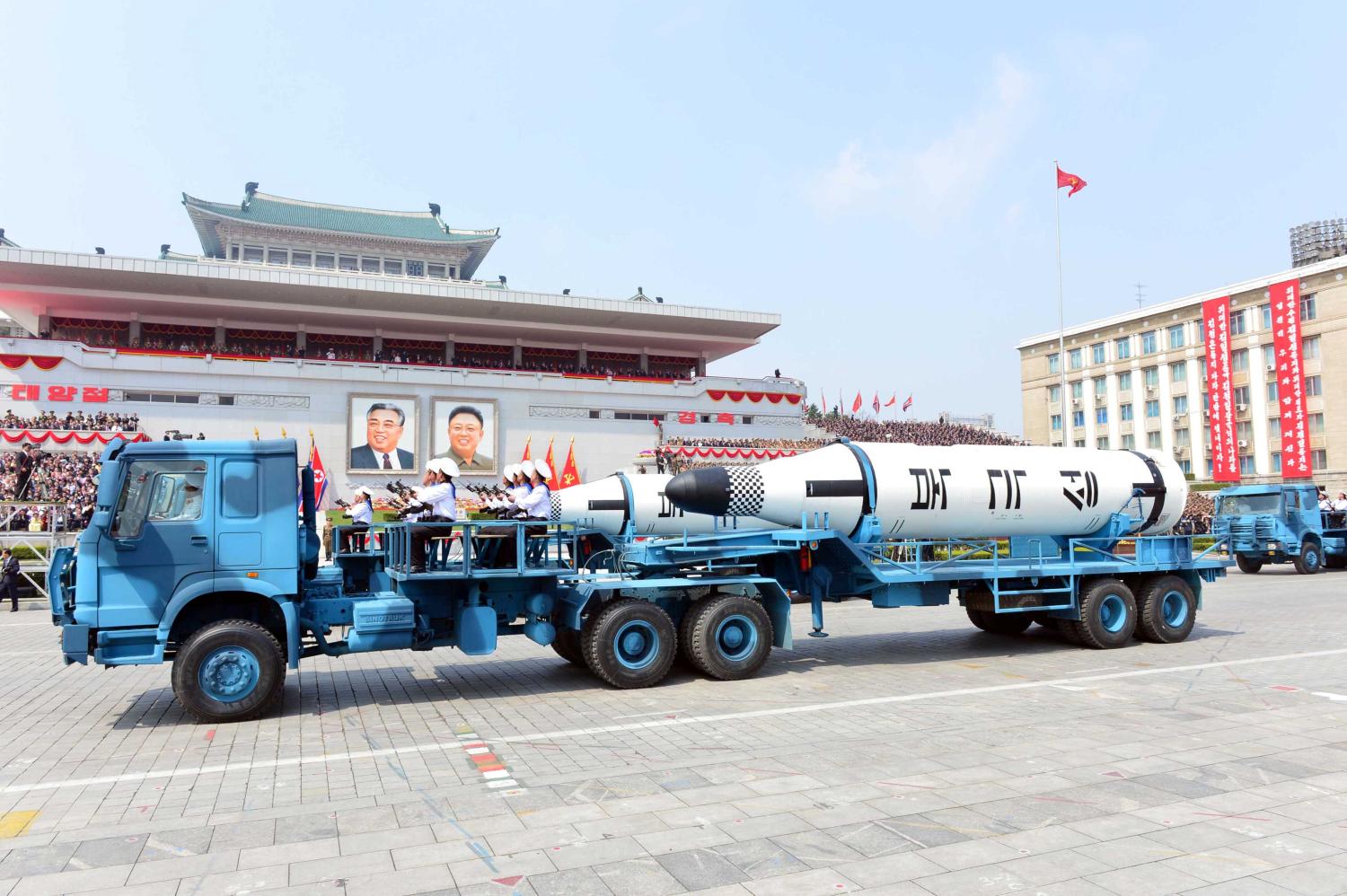 Military vehicles carry missiles with characters reading "Pukkuksong" during a military parade marking the 105th birth anniversary of country's founding father Kim Il Sung, in this undated photo, released by North Korea's Korean Central News Agency (KCNA), April 16, 2017. Picture taken April 16, 2017. KCNA/via REUTERS ATTENTION EDITORS - THIS PICTURE WAS PROVIDED BY A THIRD PARTY. REUTERS IS UNABLE TO INDEPENDENTLY VERIFY THE AUTHENTICITY, CONTENT, LOCATION OR DATE OF THIS IMAGE. FOR EDITORIAL USE ONLY. NOT FOR SALE FOR MARKETING OR ADVERTISING CAMPAIGNS. NO THIRD PARTY SALES. NOT FOR USE BY REUTERS THIRD PARTY DISTRIBUTORS. SOUTH KOREA OUT. NO COMMERCIAL OR EDITORIAL SALES IN SOUTH KOREA. THIS PICTURE IS DISTRIBUTED EXACTLY AS RECEIVED BY REUTERS, AS A SERVICE TO CLIENTS. - RTS12PR7