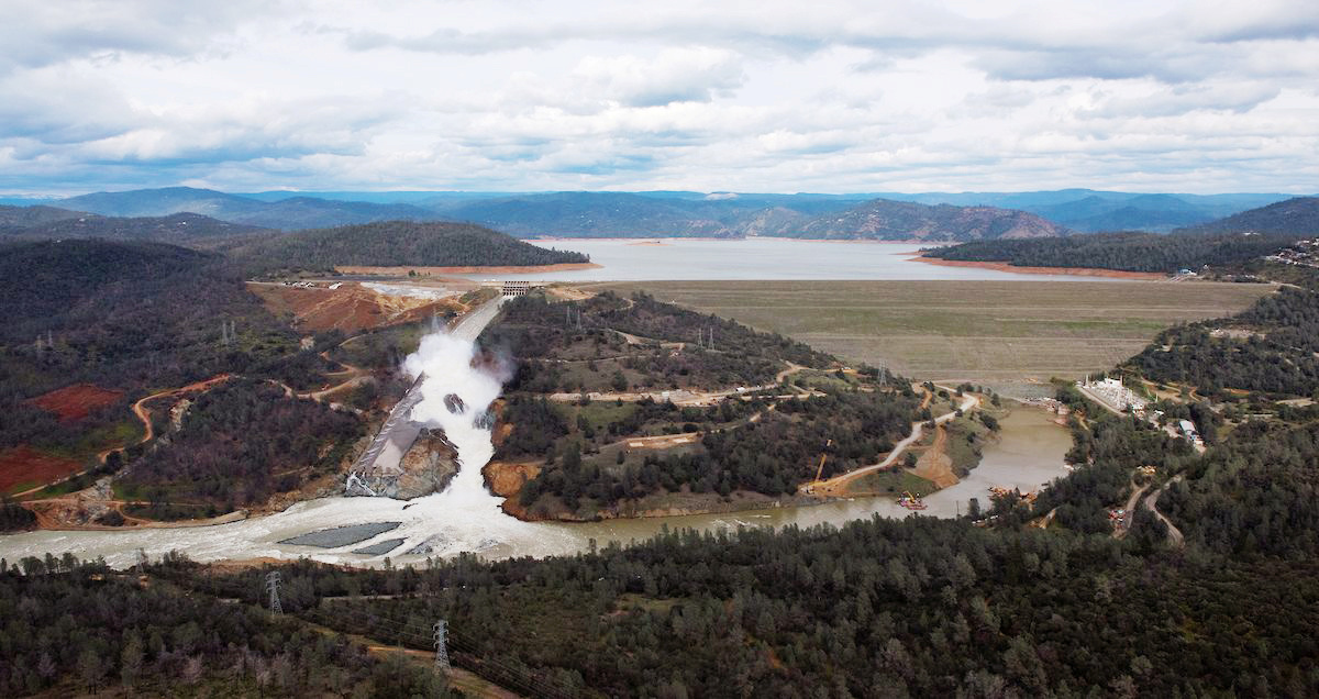 The damaged Oroville Dam spillway is pictured in an aerial view in Oroville, California, U.S. in this February 26, 2017 handout photo. Kelly M. Grow/ California Department of Water Resources/Handout via REUTERS ATTENTION EDITORS - THIS IMAGE WAS PROVIDED BY A THIRD PARTY. EDITORIAL USE ONLY THIS PICTURE WAS PROCESSED BY REUTERS TO ENHANCE QUALITY. AN UNPROCESSED VERSION WILL BE PROVIDED SEPARATELY. - RTS10UBN