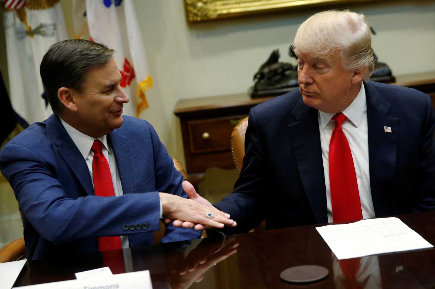 Trump meets with Timmons and National Association of Manufacturers members at the White House in Washington