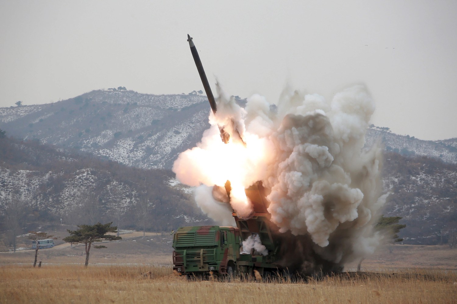 A new multiple launch rocket system is test fired in this undated photo released by North Korea's Korean Central News Agency (KCNA) in Pyongyang
