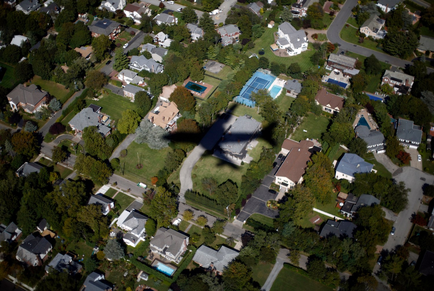 Air Force One flies over suburban Long Island as U.S. President Barack Obama arrives in New York