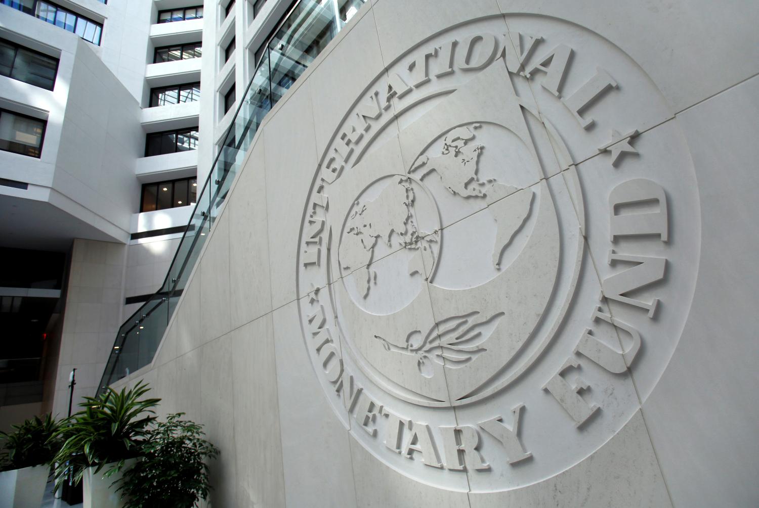 The International Monetary Fund logo is seen inside its headquarters at the end of the IMF/World Bank annual meetings in Washington