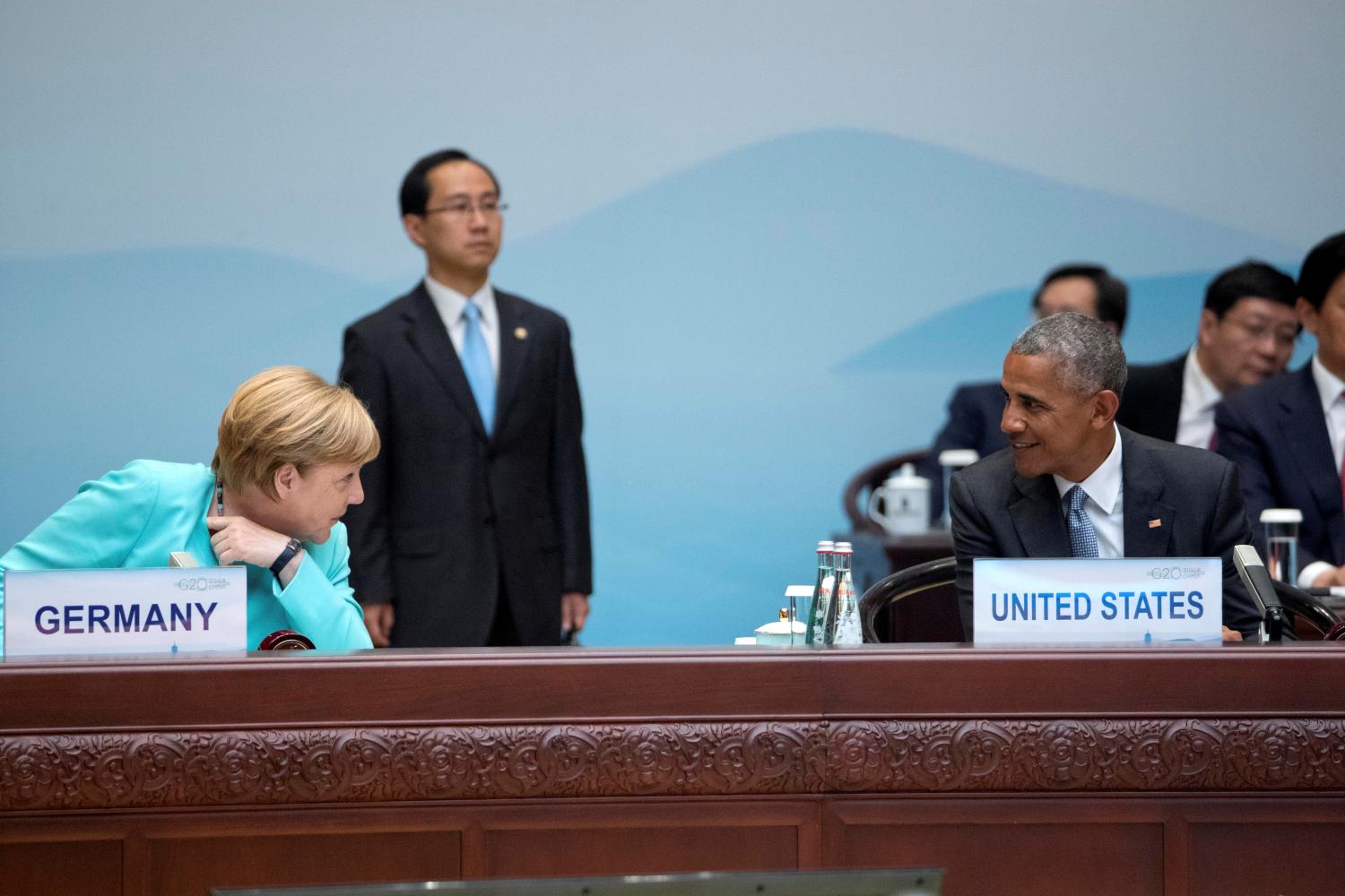 German Chancellor Angela Merkel, and U.S. President Barack Obama, talk before the start of the opening ceremony of the G-20 Summit in Hangzhou