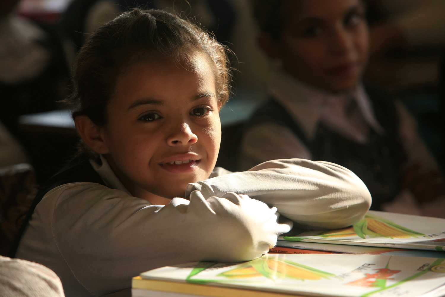 A girl attends classes after the city was recaptured from the Islamic State militants in Qayyara