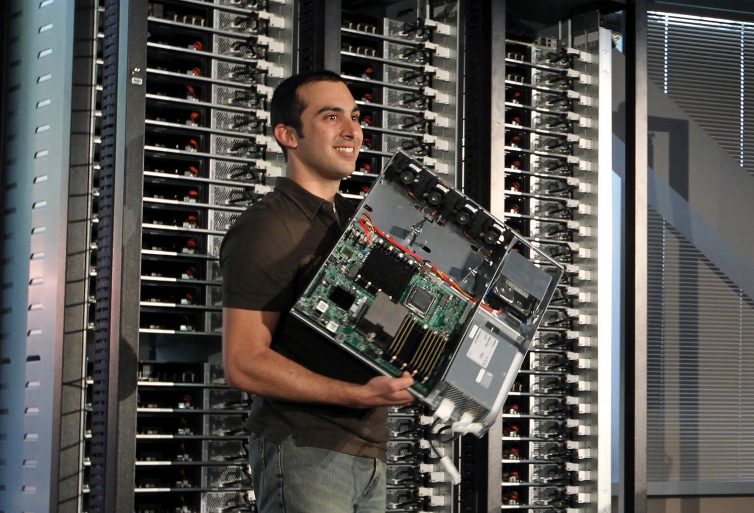 Amir Michael holds an "open compute program" server from the racks at Facebook's headquarters in Palo Alto