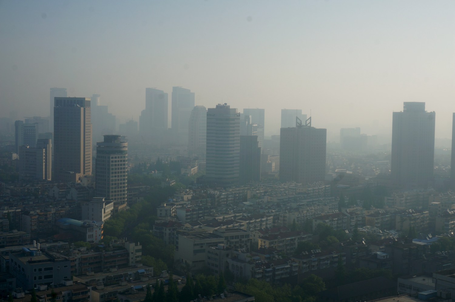 Buildings are seen during a moderately polluted day in Nanjing, Jiangsu Province, China