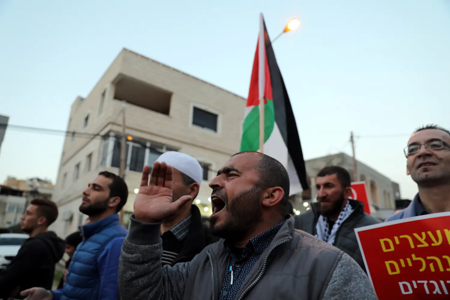 Israeli-Arabs protest against the initial approval of a bill to enforce lowering the volume of mosque loudspeakers calling worshippers to prayer, in the Israeli-Arab town of Kabul