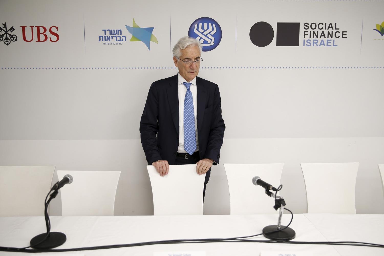 Ronald Cohen, chair of a global steering group on social impact investing, attends a news conference in Tel Aviv