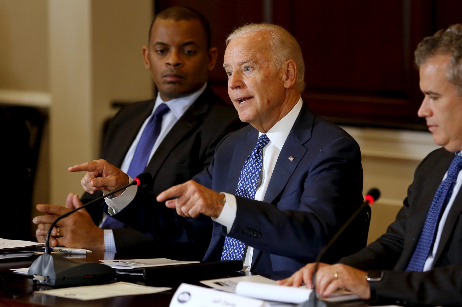Biden, flanked by Foxx and Zients, delivers opening remarks at the White House Build America Investment Initiative Roundtable in the Eisenhower Executive Office Building in Washington