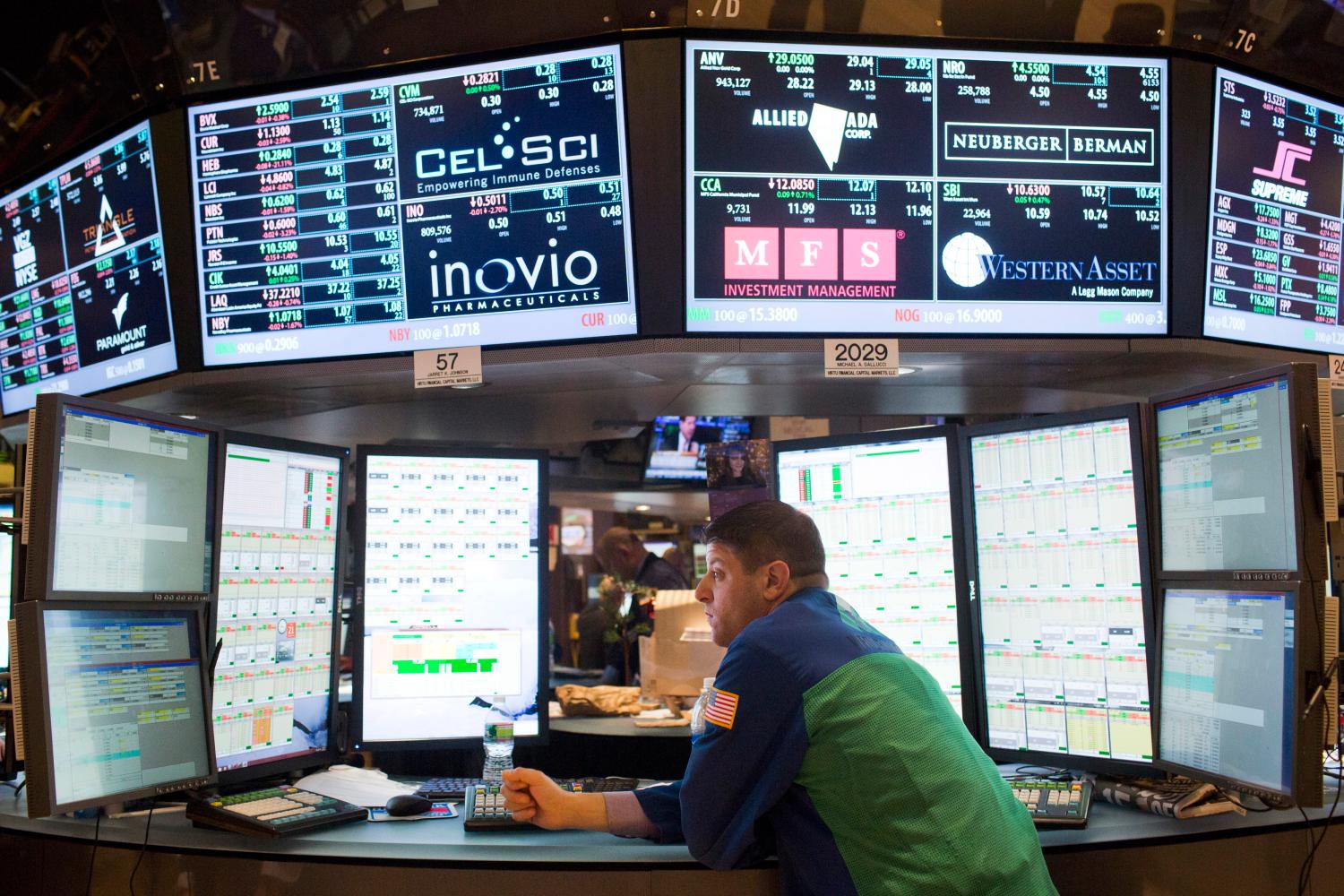 A trader works on the floor of the New York Stock Exchange in New York