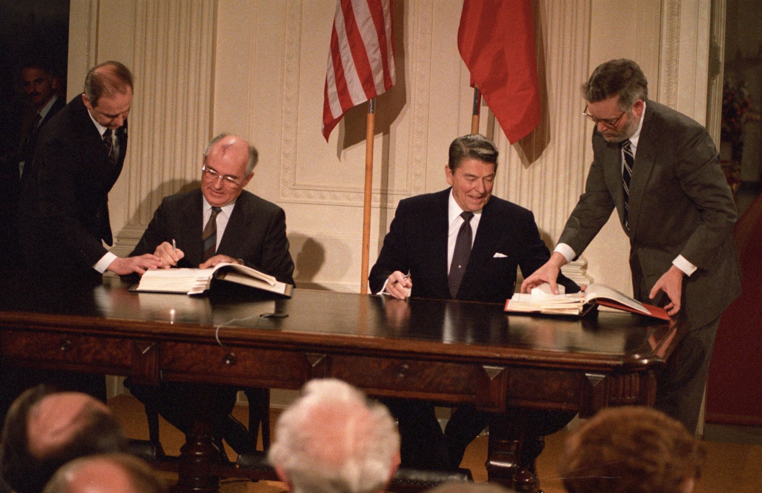 U.S. President Ronald Reagan (R) Soviet President Mikhail Gorbachev sign the Intermediate-range Nuclear Forces (INF) treaty in the White House in Washington December 8, 1987. REUTERS/Dennis Paquin (UNITED STATES - Tags: POLITICS) BEST QUALITY AVAILABLE - RTR2C9ST