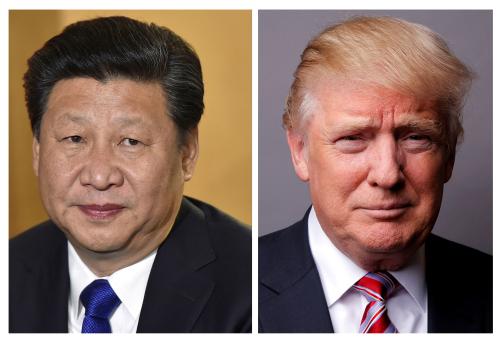 A combination of file photos showing Chinese President Xi Jinping (L) at London's Heathrow Airport, October 19, 2015 and U.S. President Donald Trump posing for a photo in New York City, U.S., May 17, 2016. REUTERS/Toby Melville/Lucas Jackson/File Photos - RTX30EFN