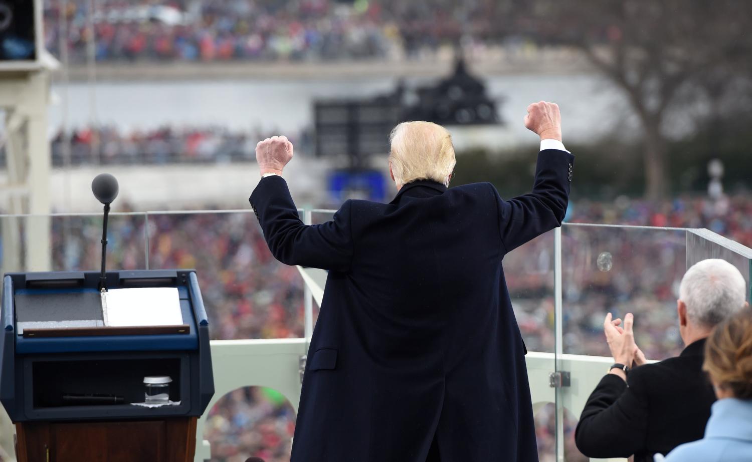 US President Donald Trump celebrates after his speech during the Presidential Inauguration at the US Capitol in Washington, D.C., U.S., January 20, 2017. REUTERS/Saul Loeb/Pool TPX IMAGES OF THE DAY - RTSWJAM