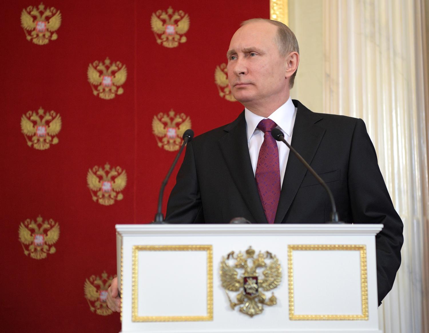 Russian President Vladimir Putin attends a joint news conference with Italian President Sergio Mattarella after their talks at the Kremlin in Moscow, Russia April 11, 2017. Sputnik/Alexei Druzhinin/Kremlin via REUTERS ATTENTION EDITORS - THIS IMAGE WAS PROVIDED BY A THIRD PARTY. EDITORIAL USE ONLY. - RTX353WK