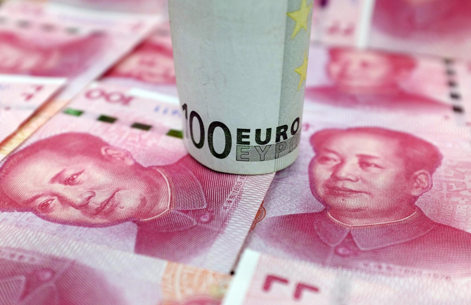 A 100-Euro banknote and Chinese 100-yuan banknotes are seen in this picture illustration, in Beijing, China, January 21, 2016. REUTERS/Jason Lee