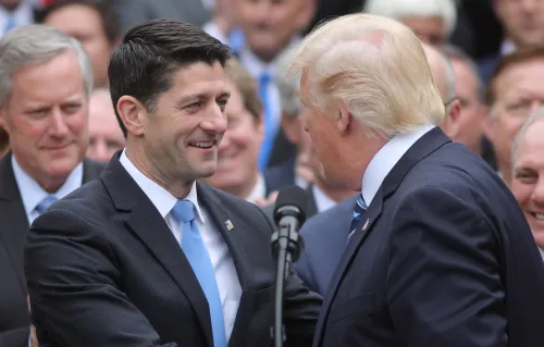 U.S. President Donald Trump congratulates House Speaker Paul Ryan