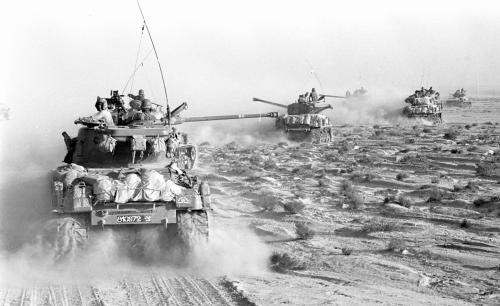 A convoy of Israeli tanks rolls through the Sinai peninsula during the 1967 Middle East War, widely known as the Six Day War, in this picture released on June 4, 2007 by Israel's Defence Ministry. Forty years ago this week, Israel swept to victory in six days in a war with Egypt, Syria and Jordan, capturing the Sinai peninsula, Golan Heights, Gaza Strip and West Bank, including Arab East Jerusalem. REUTERS/Israeli Defence Ministry/Handout BLACK AND WHITE ONLY. EDITORIAL USE ONLY. NOT FOR SALE FOR MARKETING OR ADVERTISING CAMPAIGNS. - RTR1QFP7