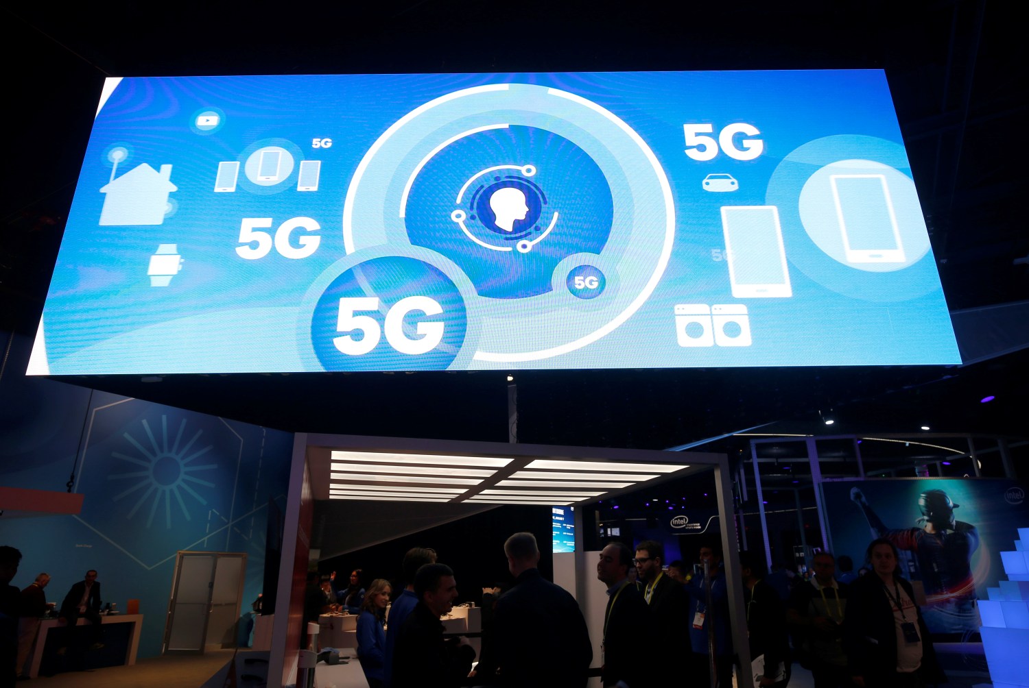 A video promotes the 5G mobile wireless standard at the Qualcomm booth during the 2017 CES in Las Vegas