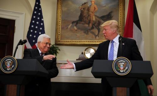 U.S. President Donald Trump shakes hands with Palestinian President Mahmoud Abbas as they deliver a statement at the White House in Washington D.C., U.S., May 3, 2017. REUTERS/Carlos Barria - RTS14ZPF