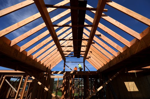 Construction workers build a single family home in San Diego, California, U.S.