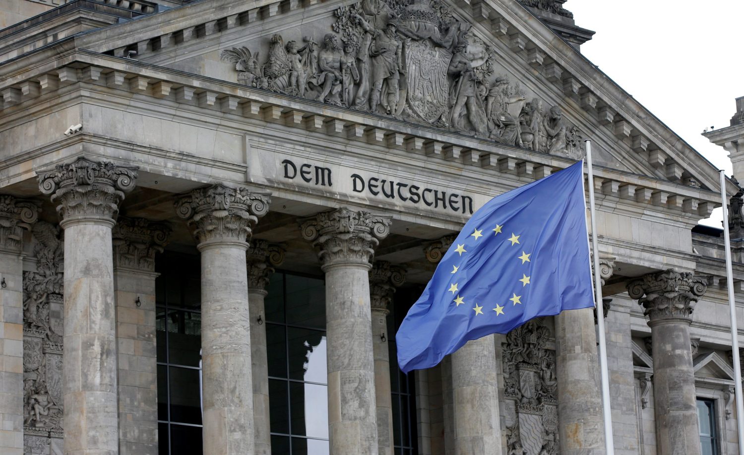 German European Union flag is pictured in front of the Reichstags building, the seat of the lower house of parliament Bundestag, before a debate about the Brexit in Berlin, Germany, June 28, 2016. REUTERS/Fabrizio Bensch - RTX2IM6E