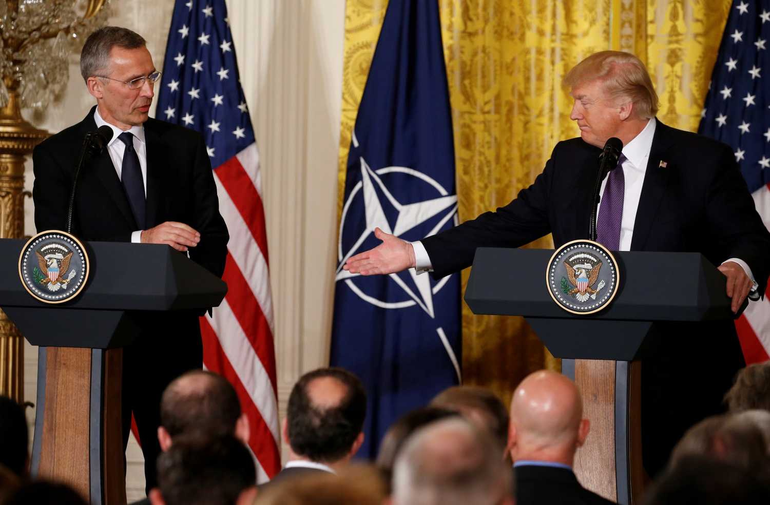 U.S. President Donald Trump (R) and NATO Secretary General Jens Stoltenberg hold a joint news conference in the East Room at the White House in Washington, U.S., April 12, 2017. REUTERS/Jonathan Ernst - RTX35B7U