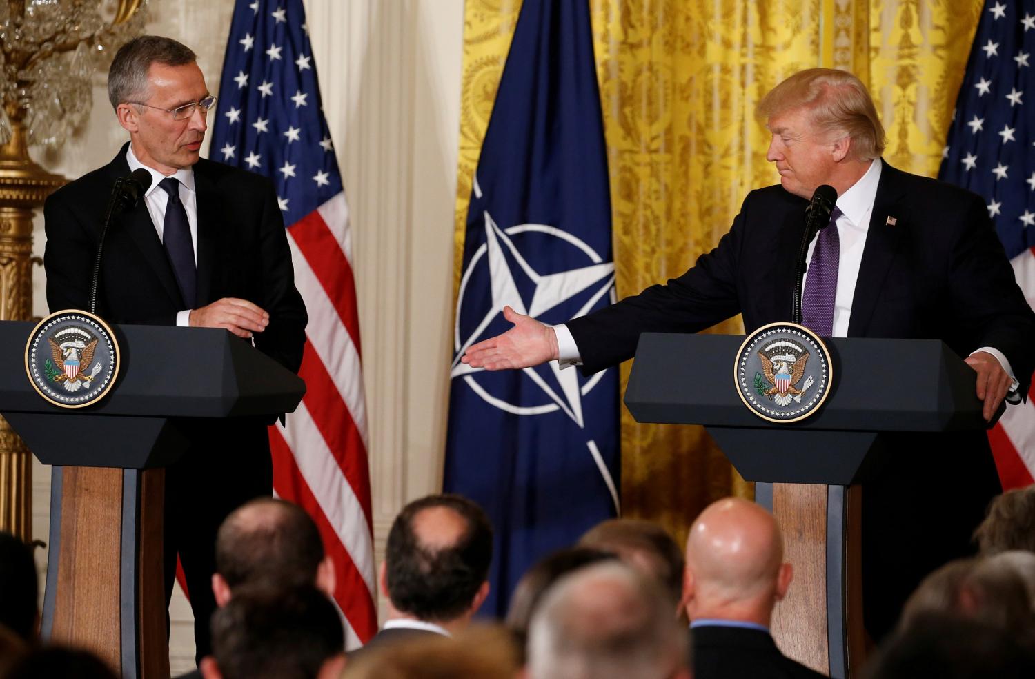 U.S. President Donald Trump (R) and NATO Secretary General Jens Stoltenberg hold a joint news conference in the East Room at the White House in Washington, U.S., April 12, 2017. REUTERS/Jonathan Ernst - RTX35B7U