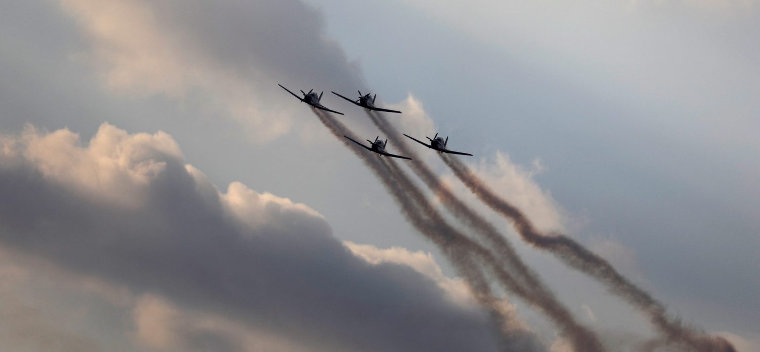 Israeli Air Force T-6 Texan II planes fly in formation during an aerial demonstration at a graduation ceremony for Israeli air force pilots at the Hatzerim air base in southern Israel December 29, 2016. REUTERS/Amir Cohen - RTX2WV2E
