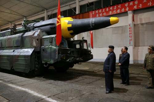 North Korean leader Kim Jong Un inspects the long-range strategic ballistic rocket Hwasong-12 (Mars-12) in this undated photo released by North Korea's Korean Central News Agency (KCNA) on May 15, 2017. KCNA via REUTERS REUTERS ATTENTION EDITORS - THIS IMAGE WAS PROVIDED BY A THIRD PARTY. EDITORIAL USE ONLY. REUTERS IS UNABLE TO INDEPENDENTLY VERIFY THIS IMAGE. NO THIRD PARTY SALES. SOUTH KOREA OUT. TPX IMAGES OF THE DAY - RTX35ZZE