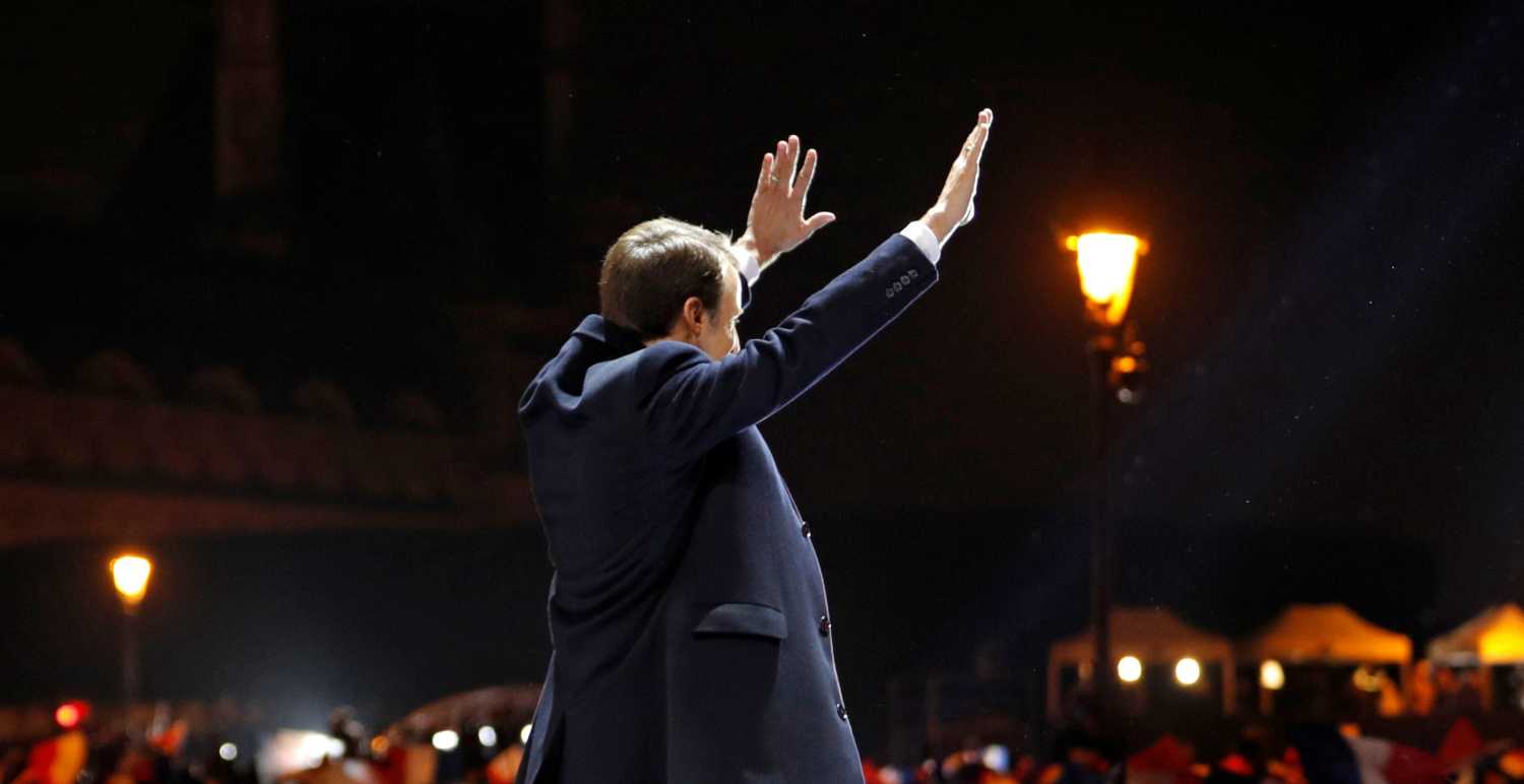 French President-elect Emmanuel Macron arrives on the stage at his victory rally near the Louvre museum after results in the 2017 presidential election in Paris, France May 7, 2017. REUTERS/Philippe Wojazer - RTS15KX5