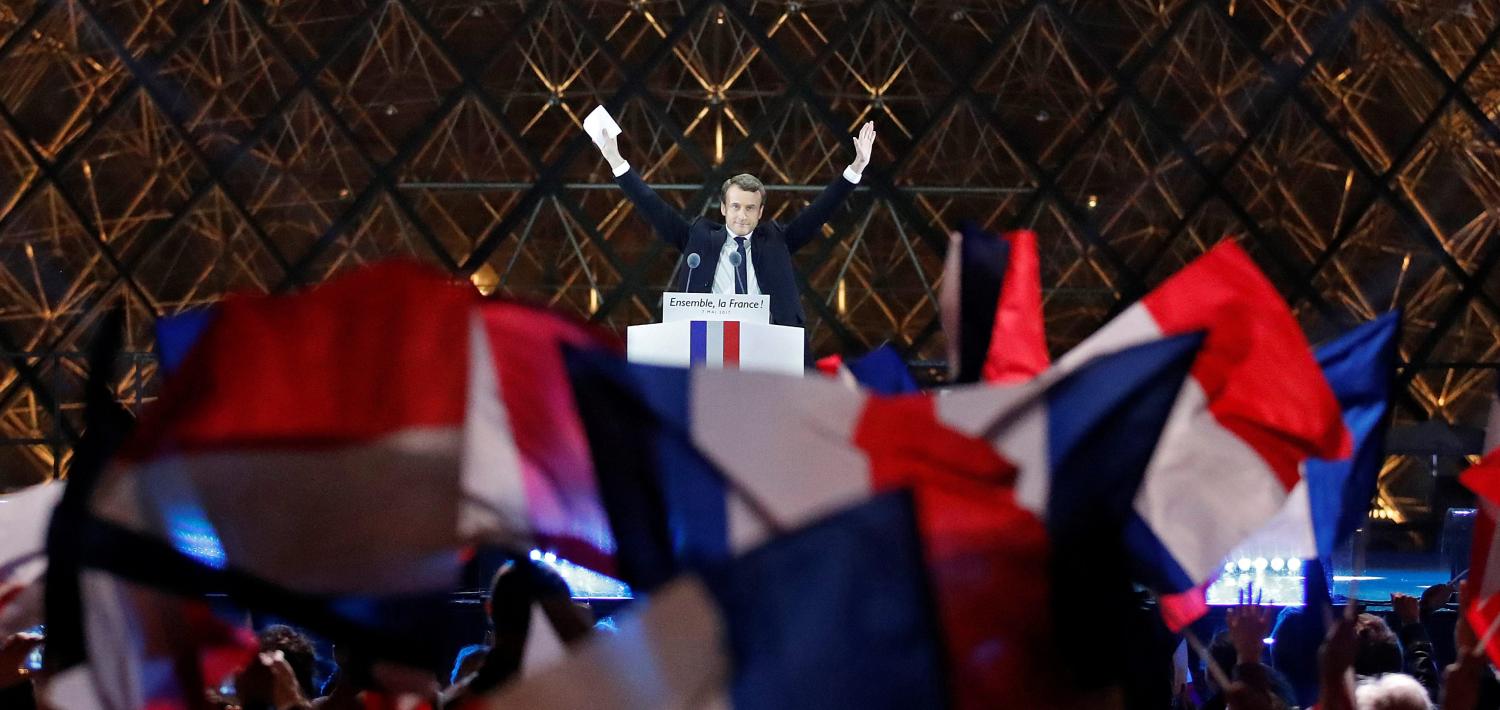 French President-elect Emmanuel Macron celebrates on the stage at his victory rally near the Louvre in Paris, France May 7, 2017. REUTERS/Christian Hartmann - RTS15KPA