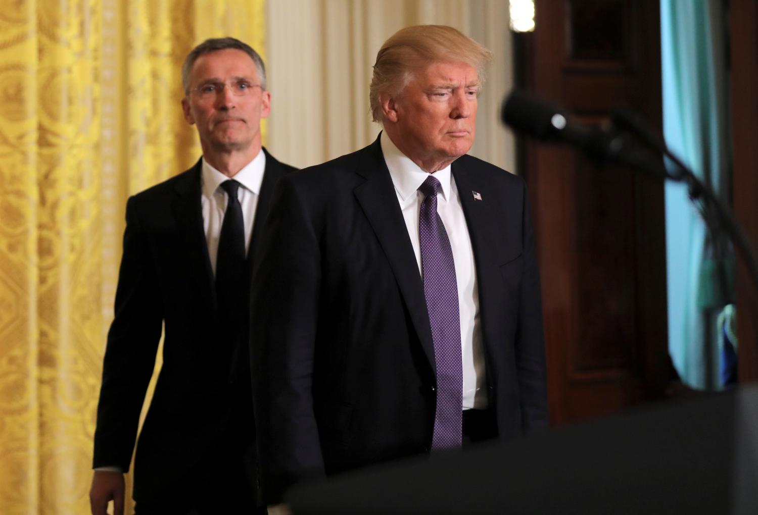 U.S. President Donald Trump (R) and NATO Secretary General Jens Stoltenberg
