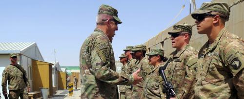 U.S. Army General John Nicholson, commander of Resolute Support forces and U.S. forces in Afghanistan, talks to U.S. soldiers during a transfer of authority ceremony at Shorab camp, in Helmand province, Afghanistan April 29, 2017. Picture taken April 29, 2017. REUTERS/James Mackenzie - RTS14IL2