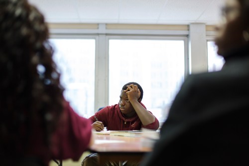 A Newark Prep Charter School student listens to math teacher, Faiza Sheikh (not pictured), give a lesson at the school in Newark, New Jersey